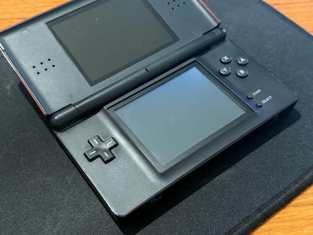 The same DS Lite after a new touch screen was installed, with a clean digitizer.