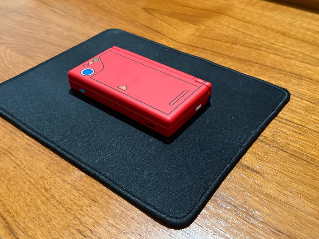 A closed red Pokedex DS Lite built from the combined parts.